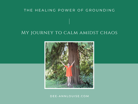 Dee-Ann Louise standing in the forest in a victorious pose surrounded by trees and shrubbery. Text reads The Healing Power of Grounding My Journey to Calm Amidst Chaos