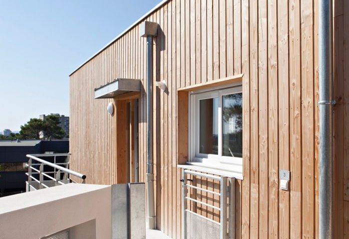 Aménagement extérieur et bardage bois d'un projet d'habitat groupé à Nîmes.