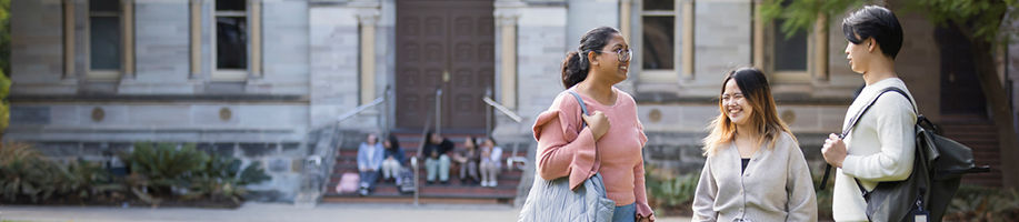 Happy students outside campus