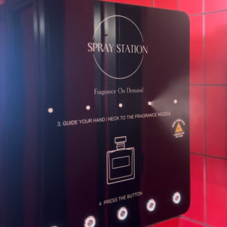 Perfume vending machine side business installed in a high-traffic venue