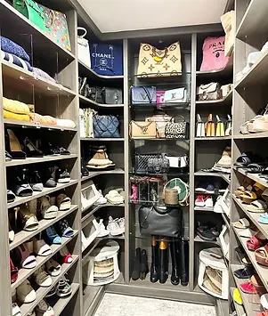 Custom Closet organization featuring designer shoes and bags