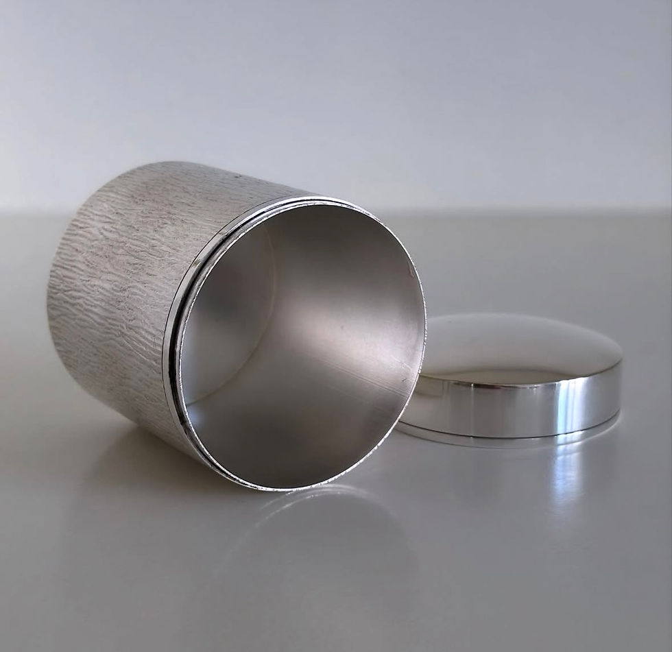 Thumbnail: A Silver Plated Cylindrical Box with a Bark Effect Design, c.1950
