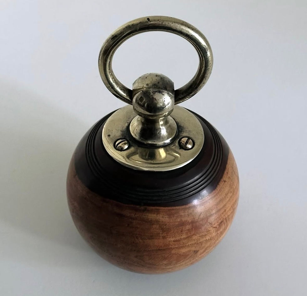 Thumbnail: An Edwardian Lignum Vitae and Brass Doorstop, c.1910
