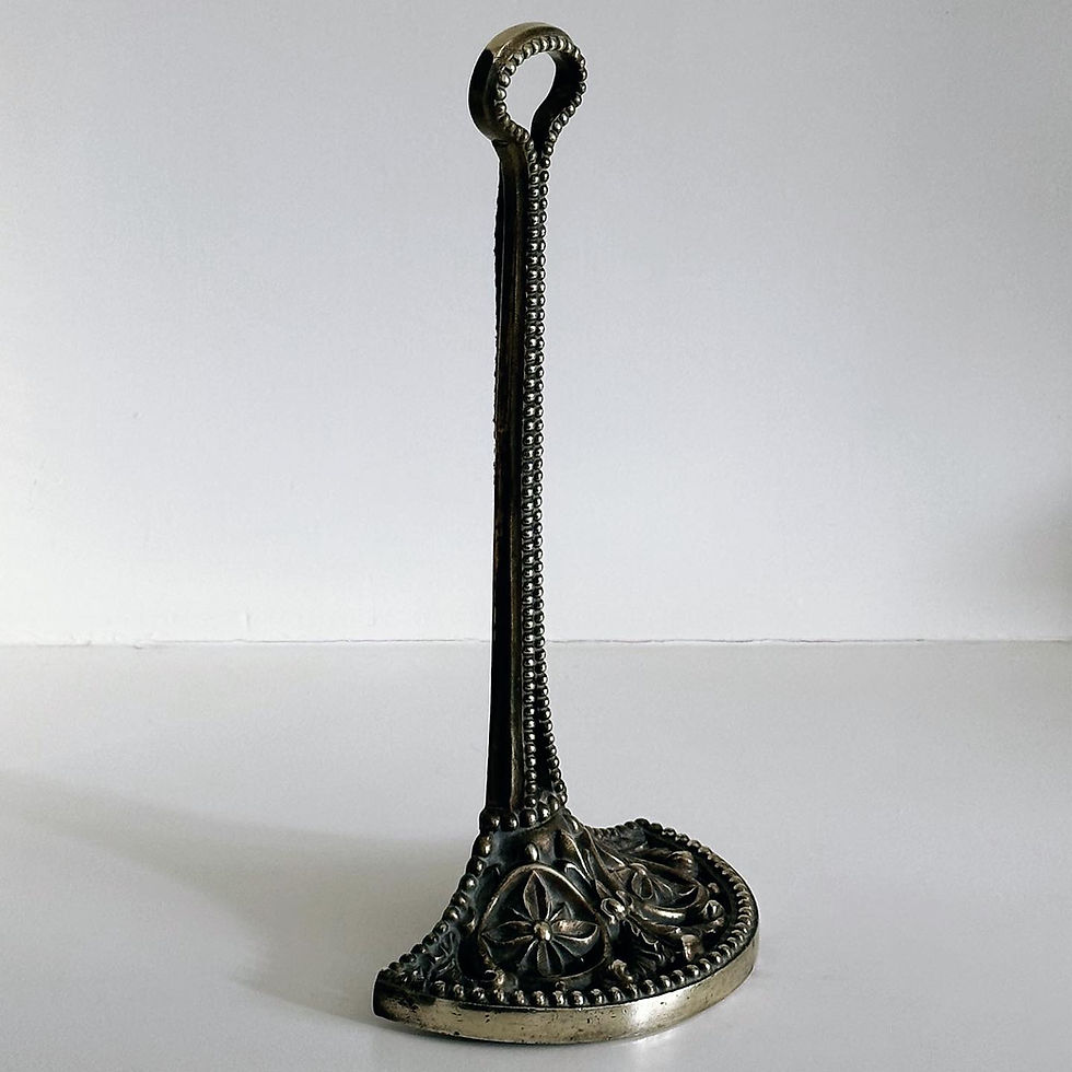 Thumbnail: A Victorian Brass Doorstop with a Beaded Carrying Handle, c.1880