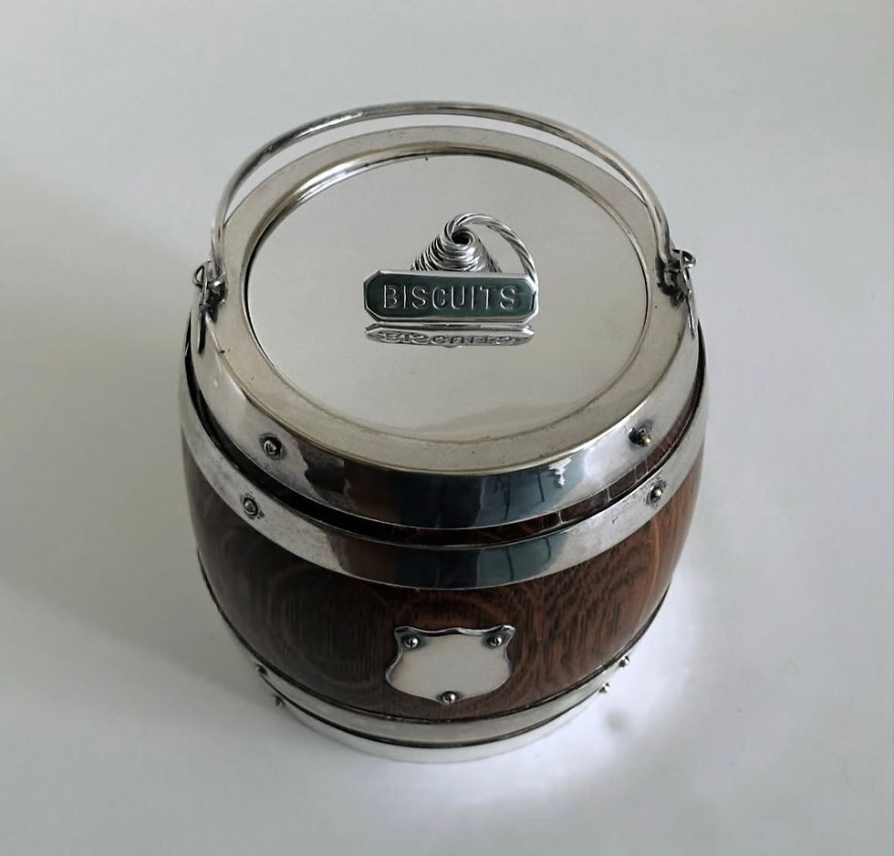 Thumbnail: An Edwardian Oak and Silver Plated Biscuit Barrel, c.1910