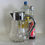 Thumbnail: A Glass and Silver Plated Lemonade Pitcher, c.1930