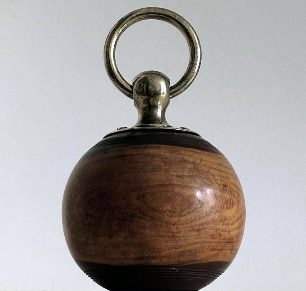 Thumbnail: An Edwardian Lignum Vitae and Brass Doorstop, c.1910