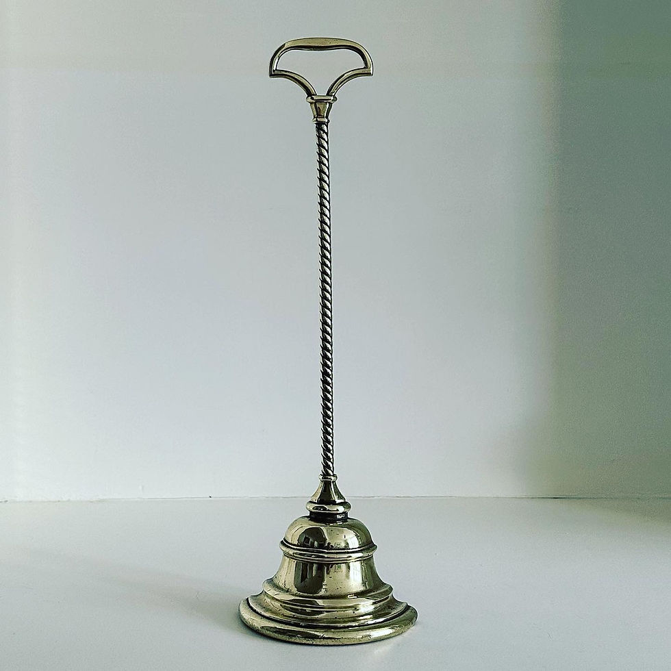 A Bell-Shaped Brass Doorstop by William Tonks and Sons