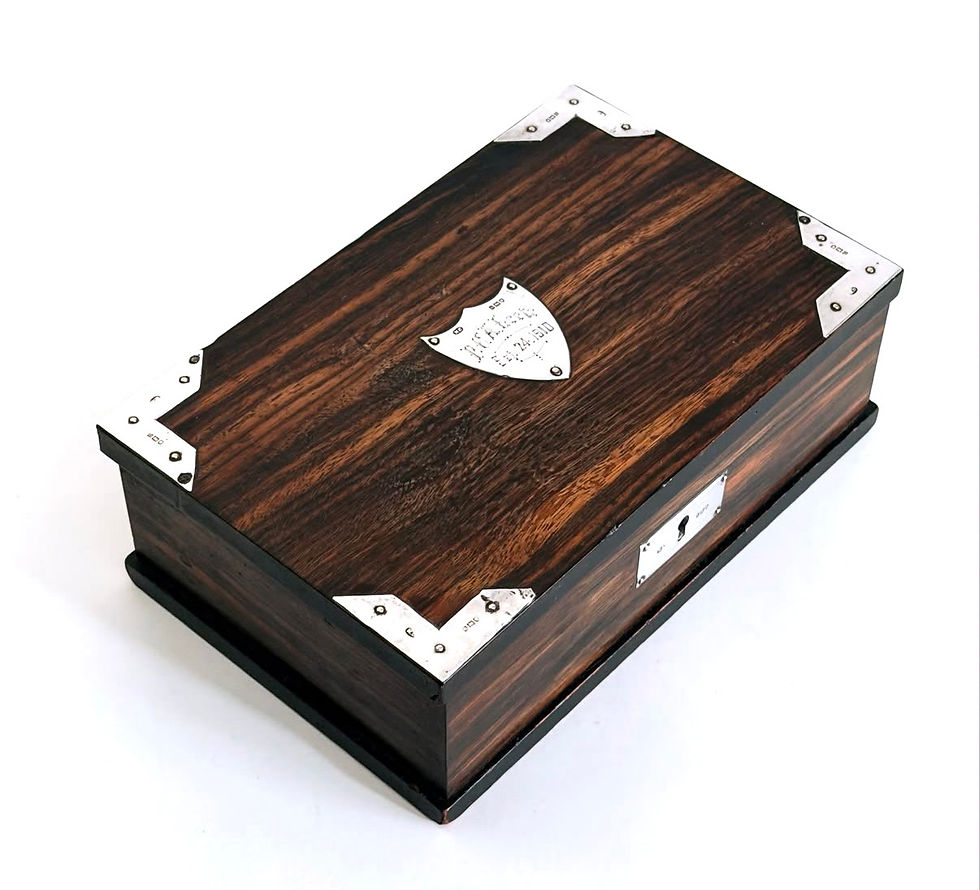Thumbnail: An Edwardian Period Coromandel and Silver Cigar Box, c.1909