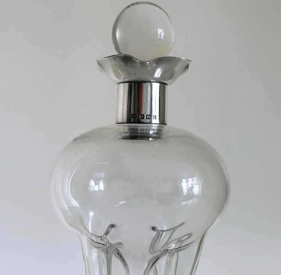 Thumbnail: An Edwardian Clear Glass and Silver Glug Glug Decanter by Thomas Woolley, c.1905