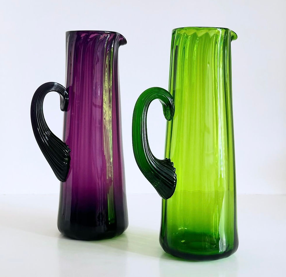 A Pair of Tall Green and Amethyst Glass Water Jugs, c.1880