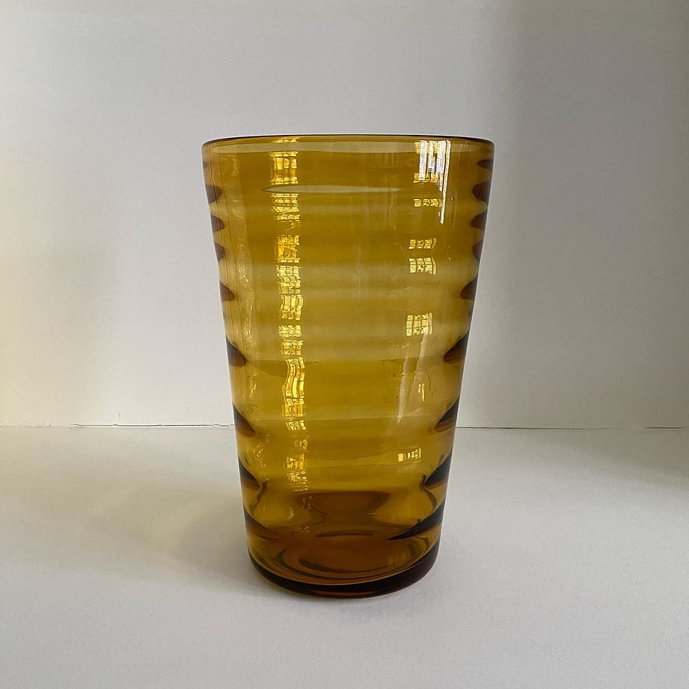 An Amber Glass Vase by Whitefriars