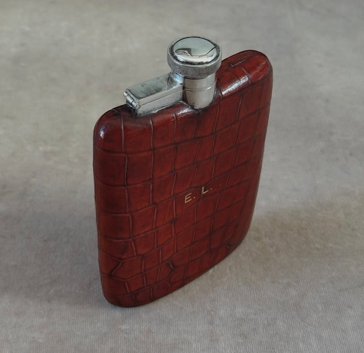 An Edwardian Crocodile Skin and Silver Plated Hip Flask, c.1910