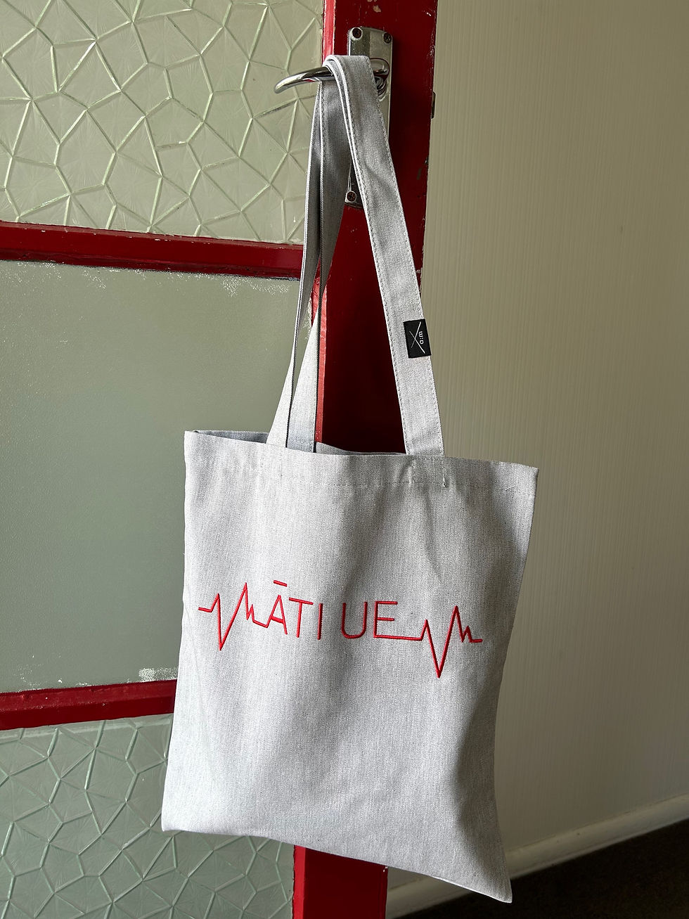 Thumbnail: Āti Ue Tote bags