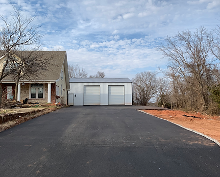 New asphalt driveway installation