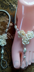 Three ivory roses.