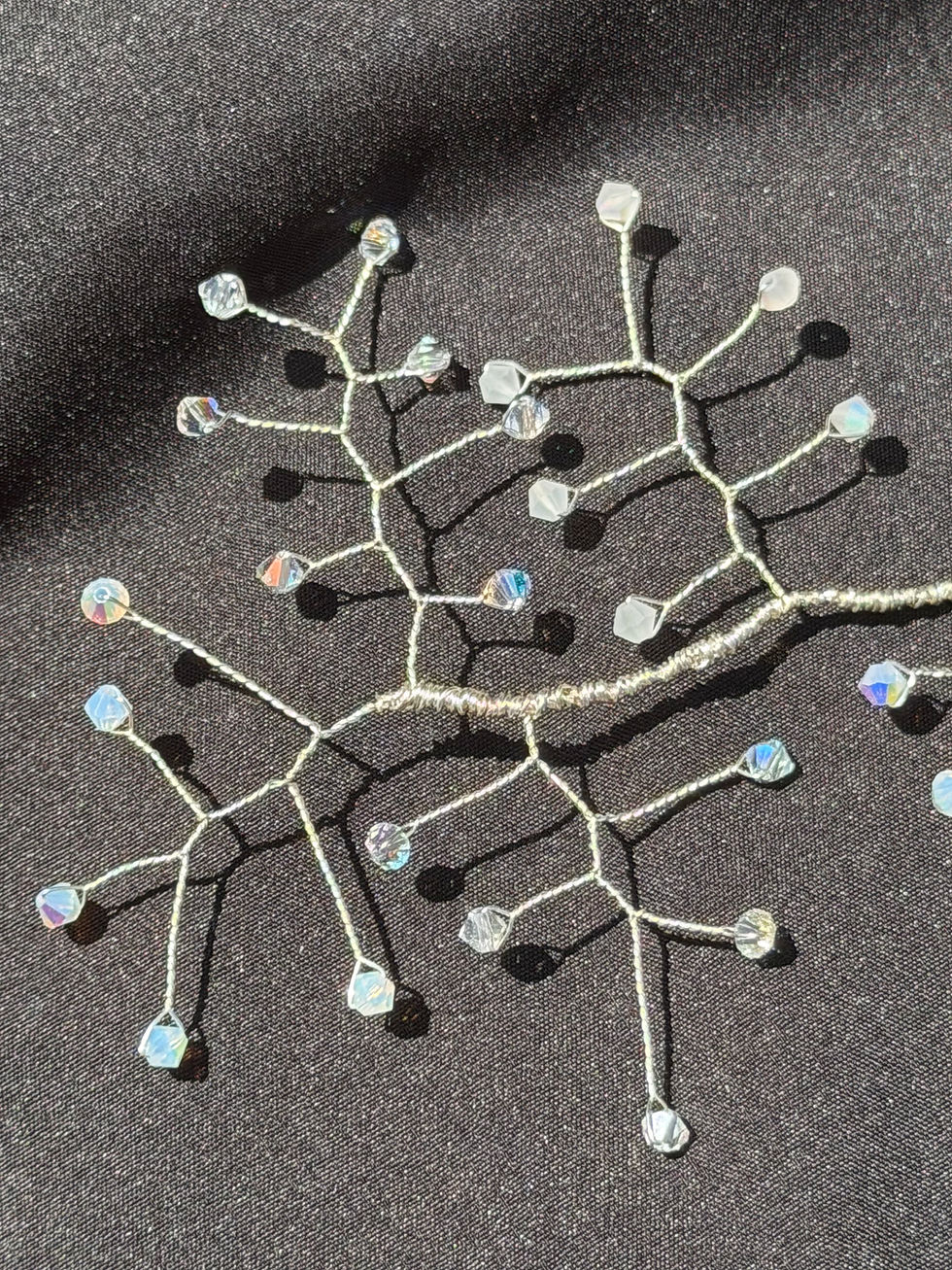 Handcrafted silver bridal hair vine with Preciosa crystals in a delicate branch design