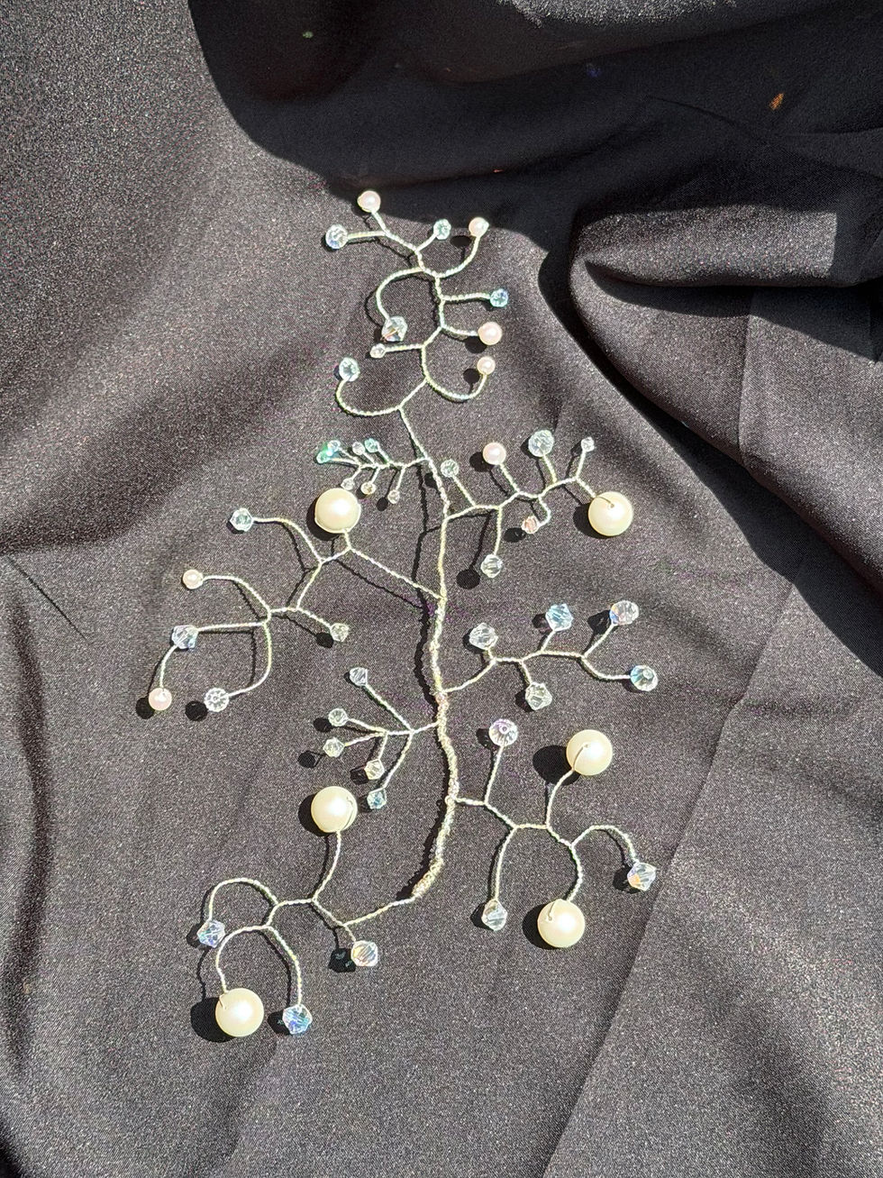 Handcrafted bridal hair vine with glass pearls and crystals on silver plated wire in a delicate organic branch design