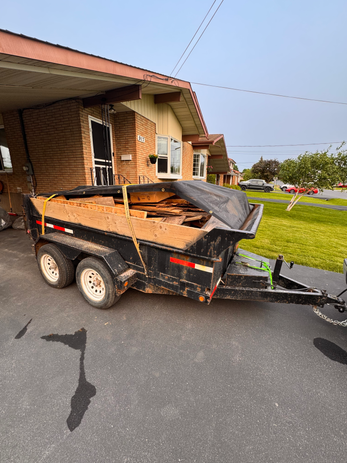Dump trailer loaded with construction debris