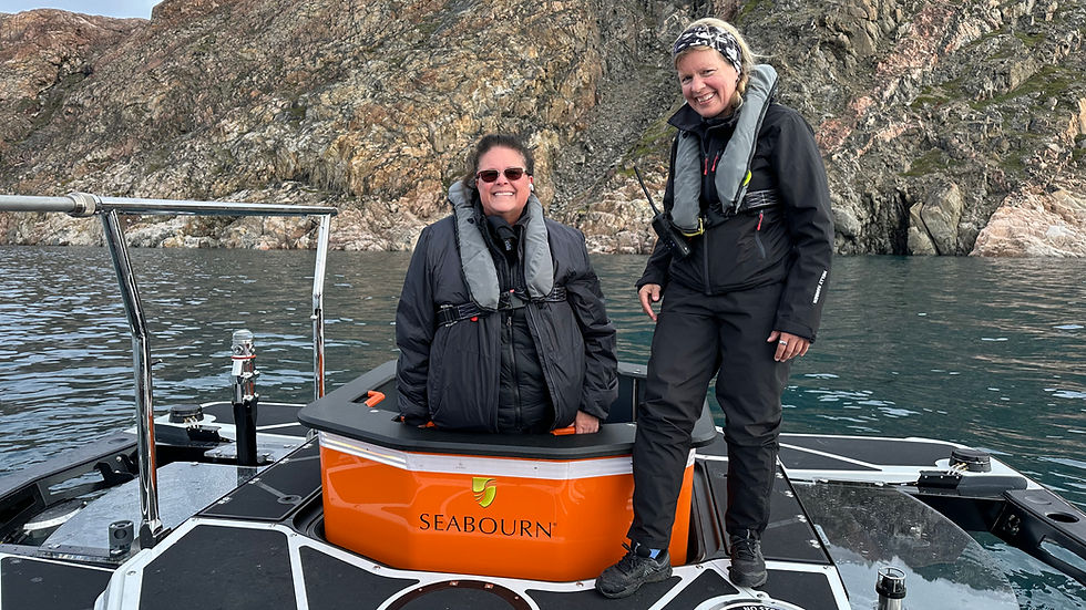 Melissa Meredith Fail climbing into the Seabourn Venture submersible on an expedition cruise to Greenland