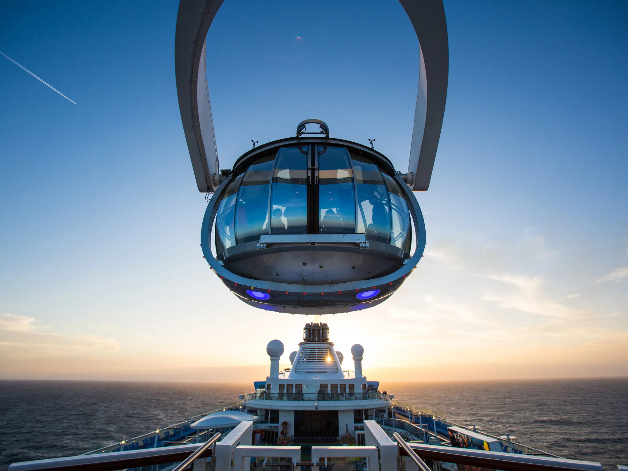 Royal Caribbean's North Star! It's a glass-enclosed capsule attached to a mechanical arm that lifts passengers over the side of the ship to provide panoramic views from up to 300 feet above sea level.