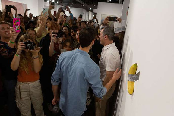 At Art Basel, a banana taped to the wall sold $120,000. Who are they mocking?