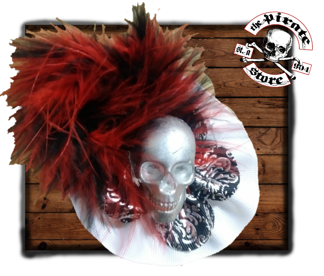 Silver skull with ruby feathers