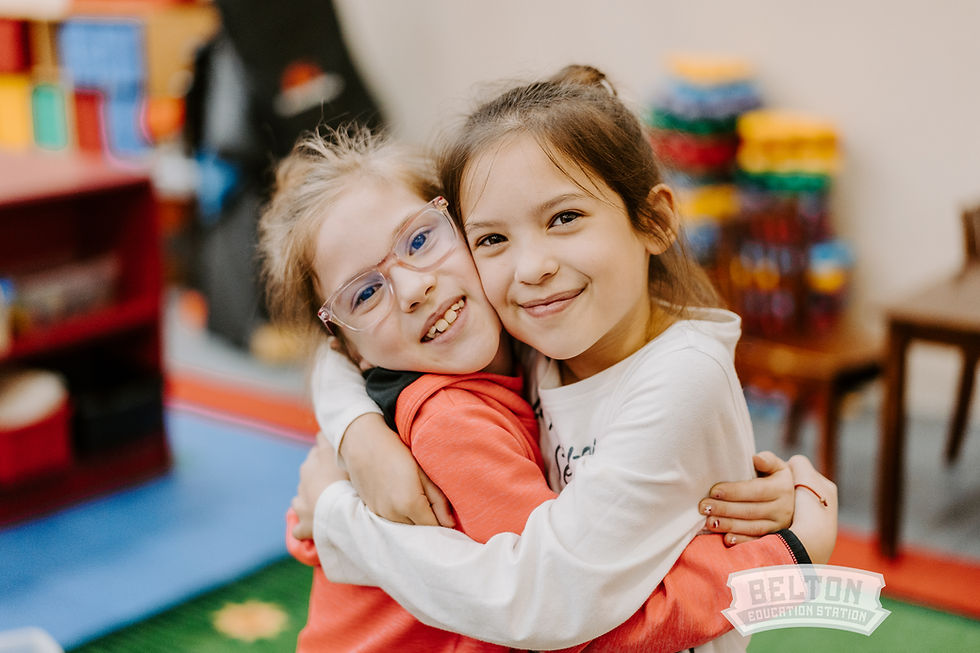 Friends hugging at spring break camp