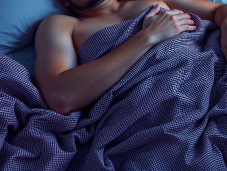 Man sleeping on bed