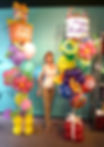 2 very tall balloon bouquets and balloon designer