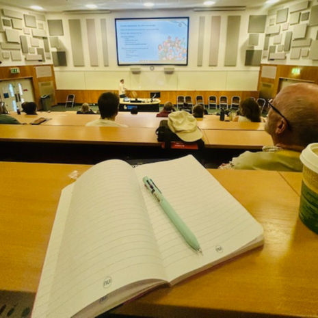 New note book and pen at the ready to take copious notes from Dr Daan Van der Veen,