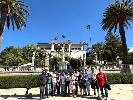 Family standing in front of Hearst Castle, Casa Grande
