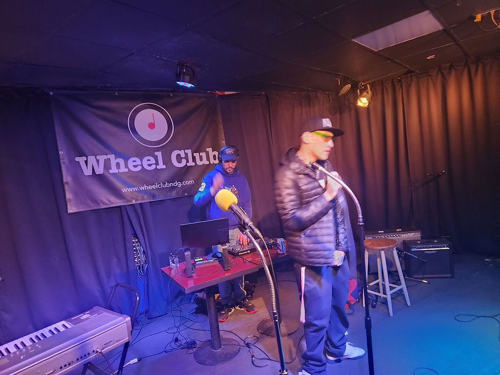 Travis Bryant & Vincent Pryce performing at The Wheel Club