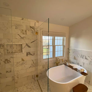 Custom Tile Bathroom Installation on floors, walls, and shower