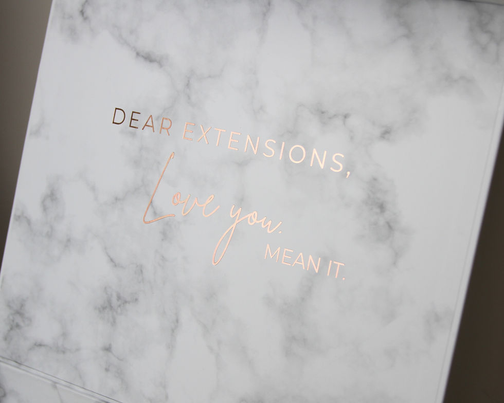 Thumbnail: White marble lid of the Extension Care Kit with rose gold text reading 'Dear Extensions, Love you. Mean it.