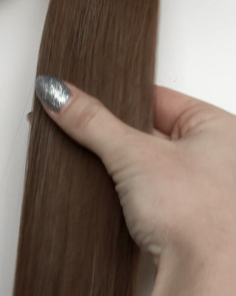 Thumbnail: Video demonstration of Cassandra (#2-4) K-Tip Extensions showcasing natural shine and movement.