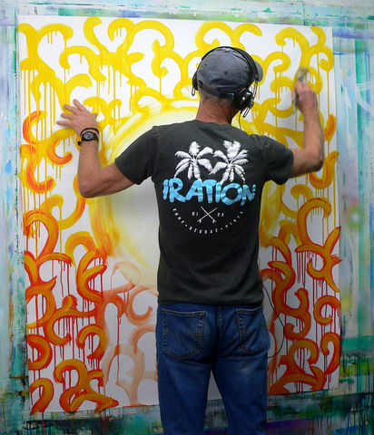 Michael Pruden artist painting in his studio
