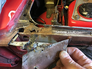 rusty Lancia Delta scuttle
