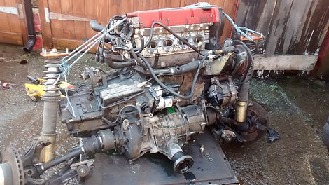 Lancia Delta engine out and on trolley