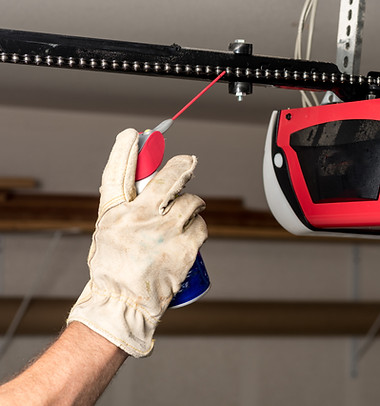 Applying Oil to Chain of Garage Door