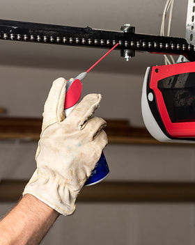 Applying Oil to Chain of Garage Door