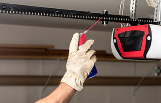 Applying Oil to Chain of Garage Door