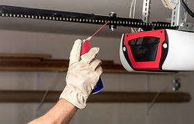 Applying Oil to Chain of Garage Door