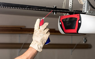 Applying Oil to Chain of Garage Door