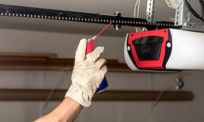 Applying Oil to Chain of Garage Door
