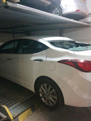 מתקן חניה צנח ומחץ רכב!