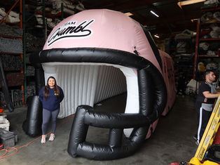 Custom inflatable football helmet tunnel Team Crumbl Cookies