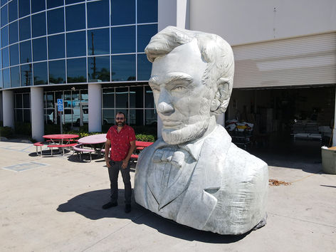 A life-size inflatable Lincoln statue, replicating the legendary U.S. President. This inflatable monument is great for government events, civic celebrations, and themed promotions.