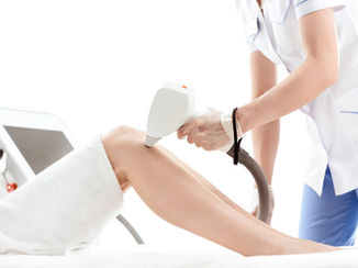 Close up of patient receiving laser therapy on knee