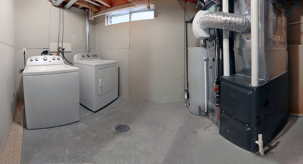 A home laundry room with a dryer, washer, a high-efficiency furnace with a residential gas water heater & a humidifier.